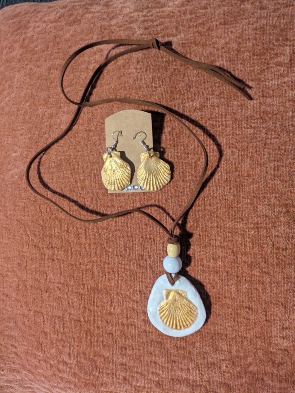 Unique Handcrafted Gold Shell Drop Earrings with Brown Suede Necklace Accent